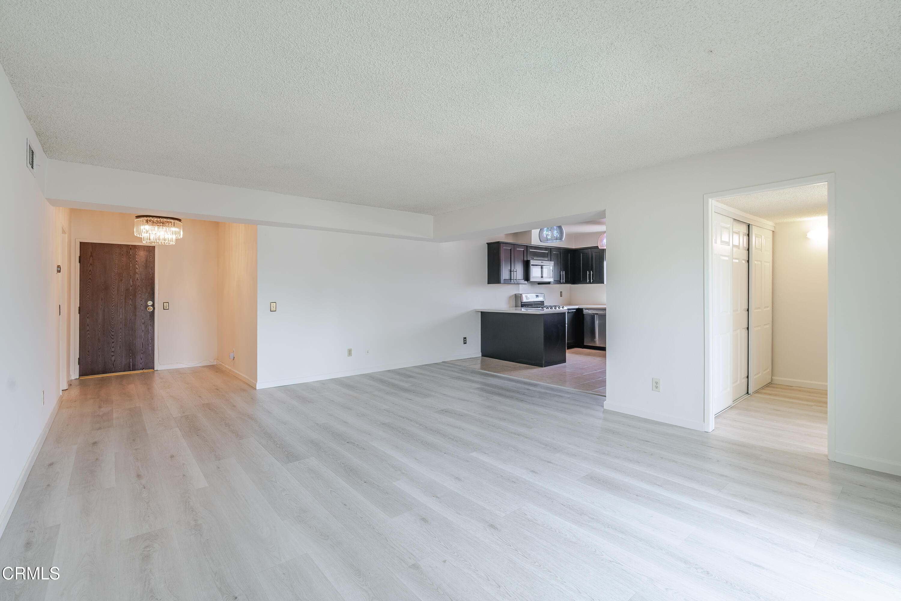 500 Jackson Place, Unit 313 Glendale, CA 91206 - Photo 2 of 19 a view of empty room with kitchen and sink