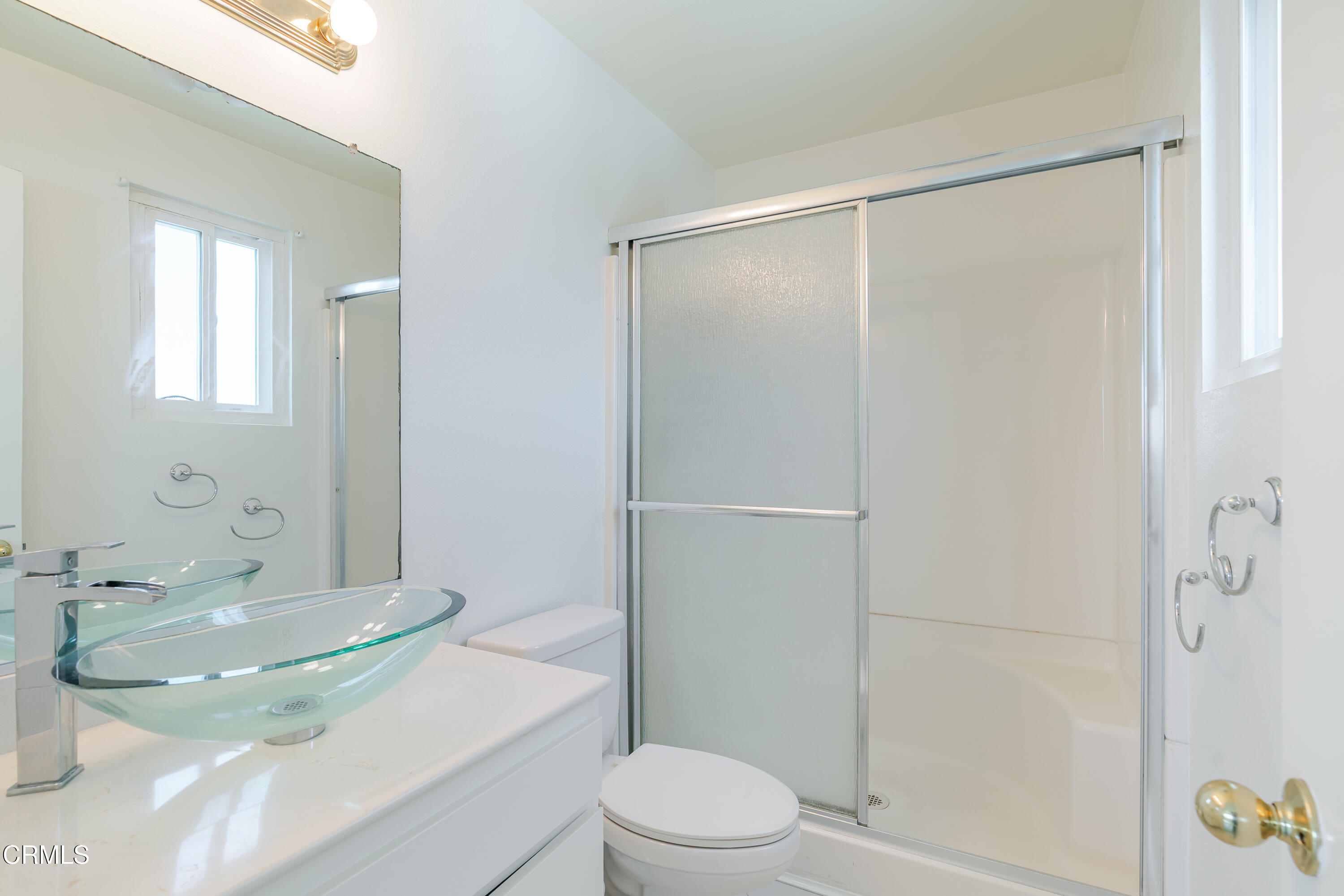 500 Jackson Place, Unit 313 Glendale, CA 91206 - Photo 9 of 19 a bathroom with a sink toilet and shower
