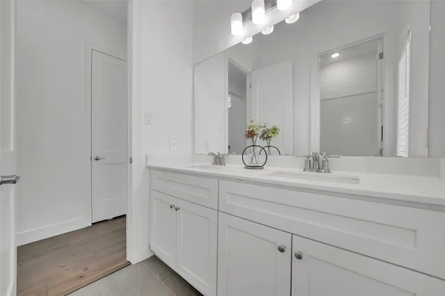 a white toilet sitting next to a bath tub