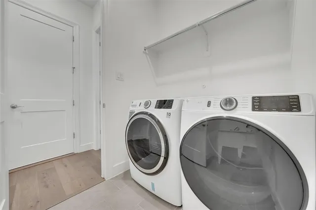 a bedroom with a bed and a shower