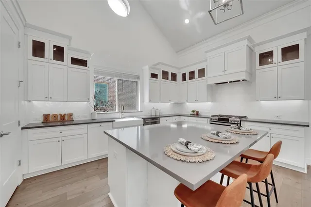 a spacious bedroom with a bed and window