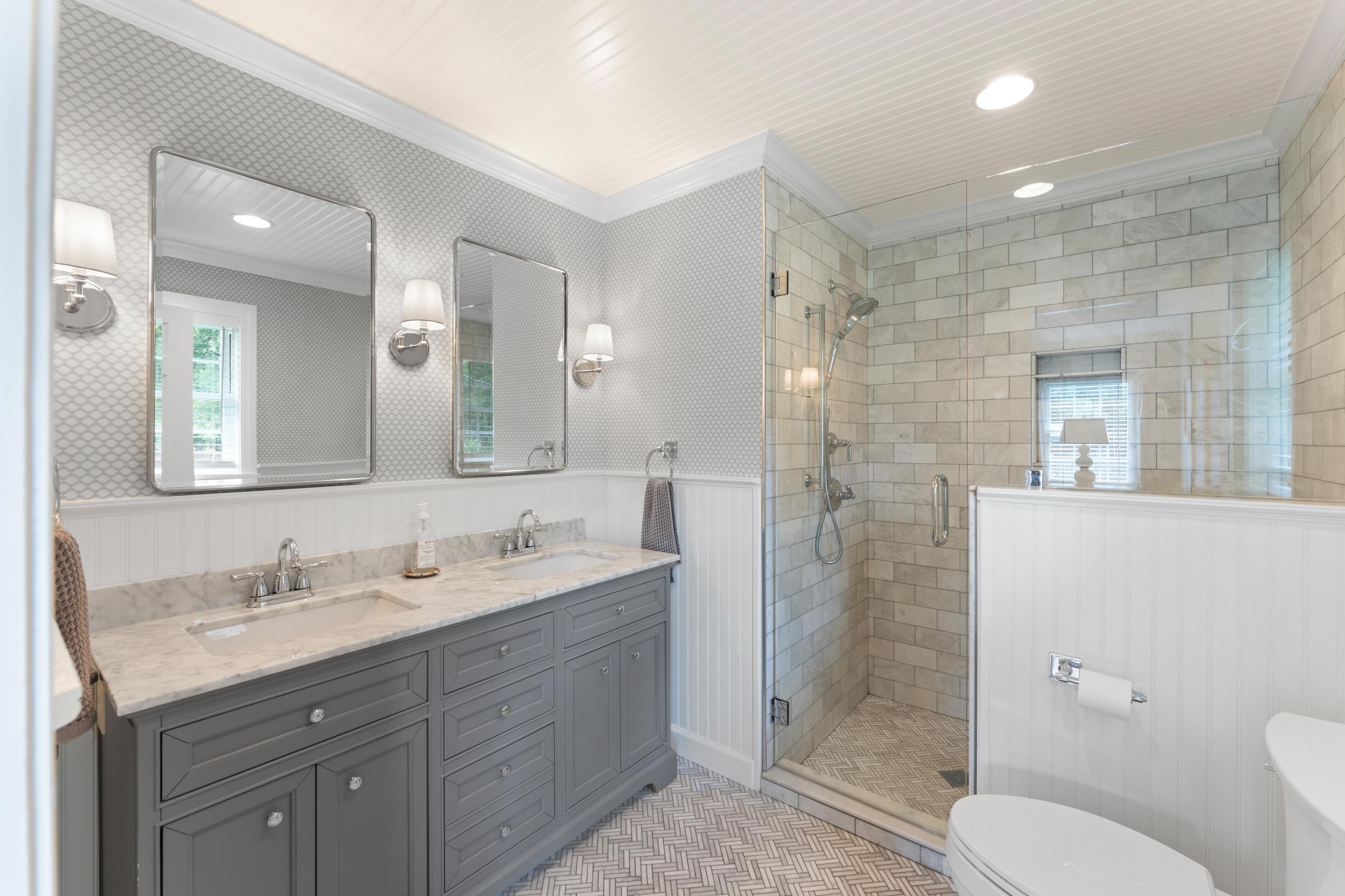 1226 Fair Meadow Road Memphis, TN 38117 - Photo 19 of 40 Primary bathroom with large granite vanity with dual sinks and a walk-in shower with frameless door.