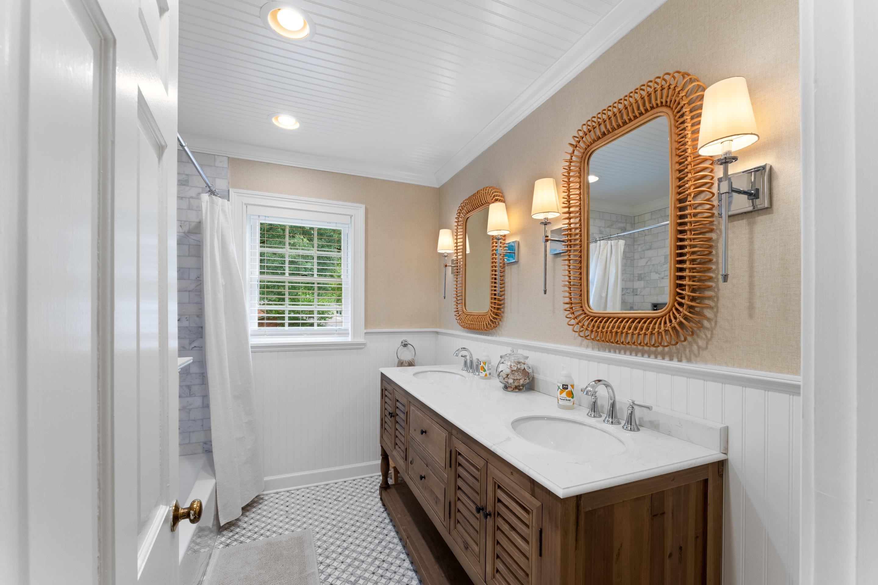 1226 Fair Meadow Road Memphis, TN 38117 - Photo 27 of 40 Bathroom with vanity with extensive cabinet space, dual sinks, tile floors, and ornamental molding.