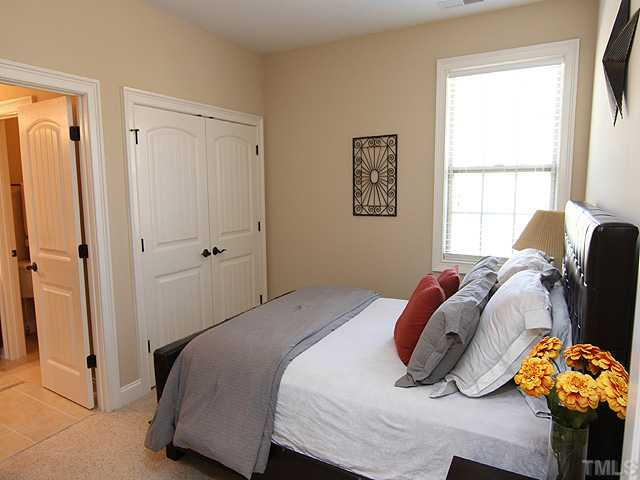 12924 Edsel Drive Raleigh, NC 27613 - Photo 19 of 25 5th bedroom upstairs, has access to the Buddy bath and plenty of closet space. Bedroom