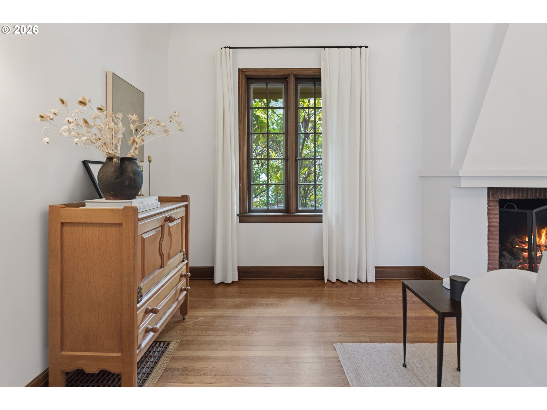 2897 Southwest Rutland Terrace Portland, OR 97205 - Photo 11 of 46 a living room with furniture and a fireplace