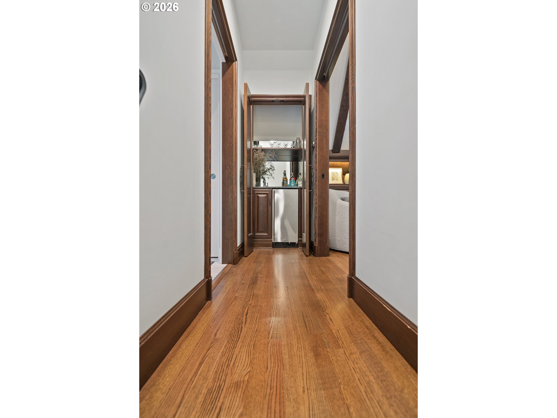 2897 Southwest Rutland Terrace Portland, OR 97205 - Photo 22 of 46 a view of a hallway with wooden floor