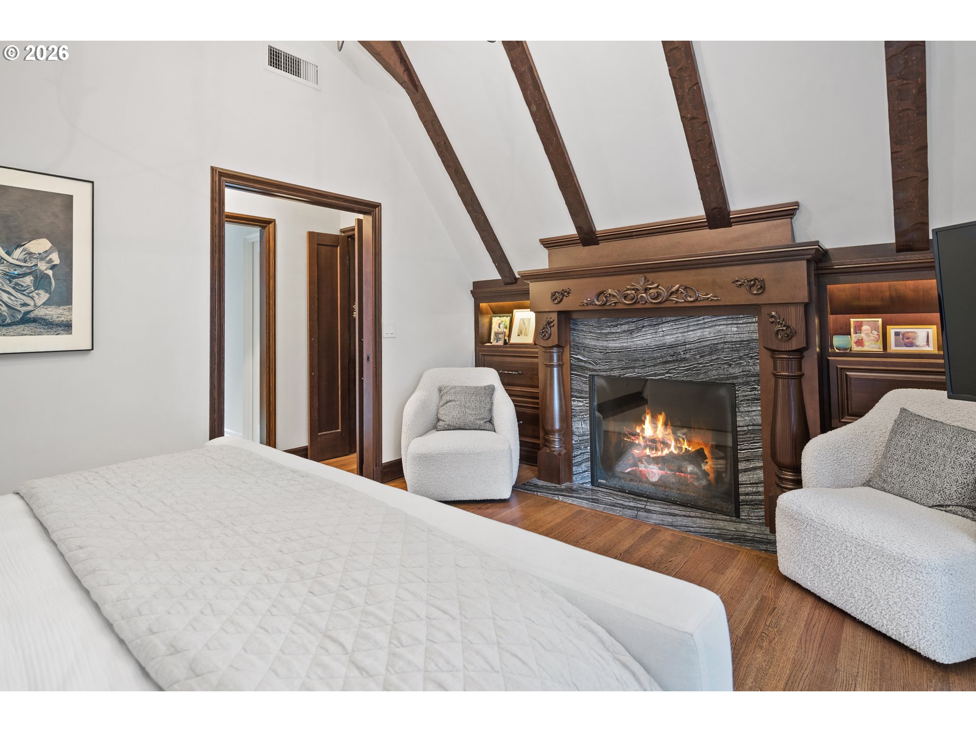 2897 Southwest Rutland Terrace Portland, OR 97205 - Photo 24 of 46 a living room with furniture and a fireplace