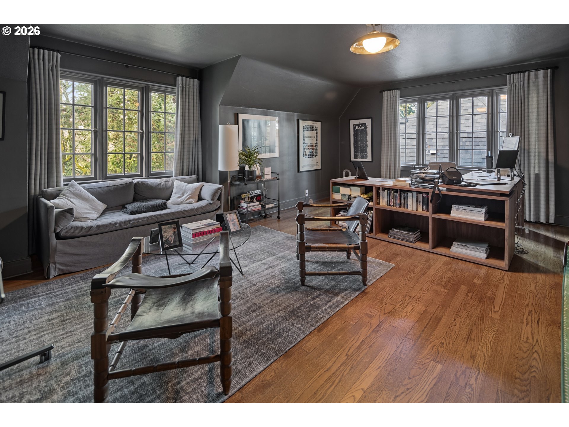 2897 Southwest Rutland Terrace Portland, OR 97205 - Photo 31 of 46 a living room with furniture and a wooden floor