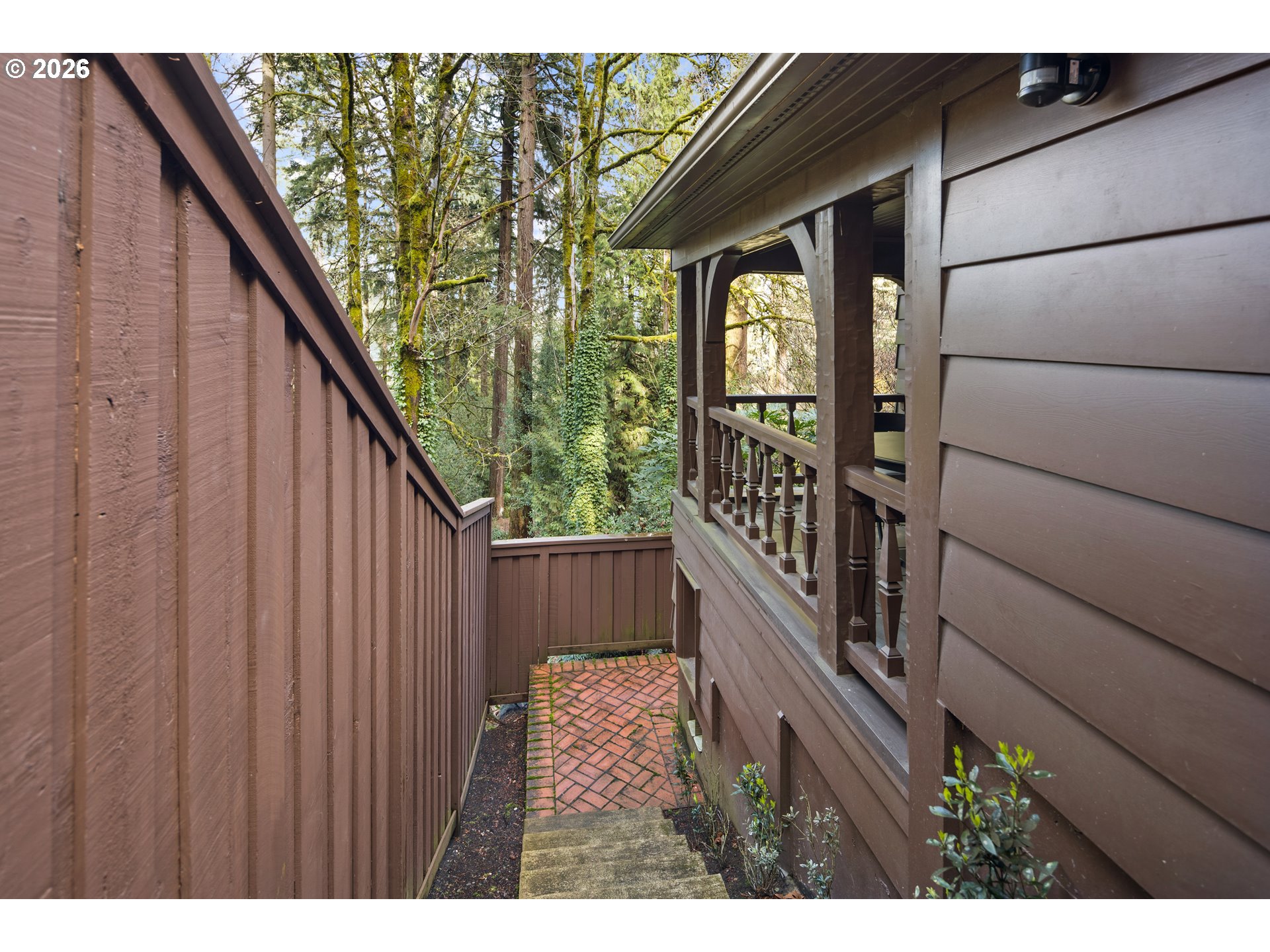 2897 Southwest Rutland Terrace Portland, OR 97205 - Photo 42 of 46 a view of balcony with wooden floor and fence
