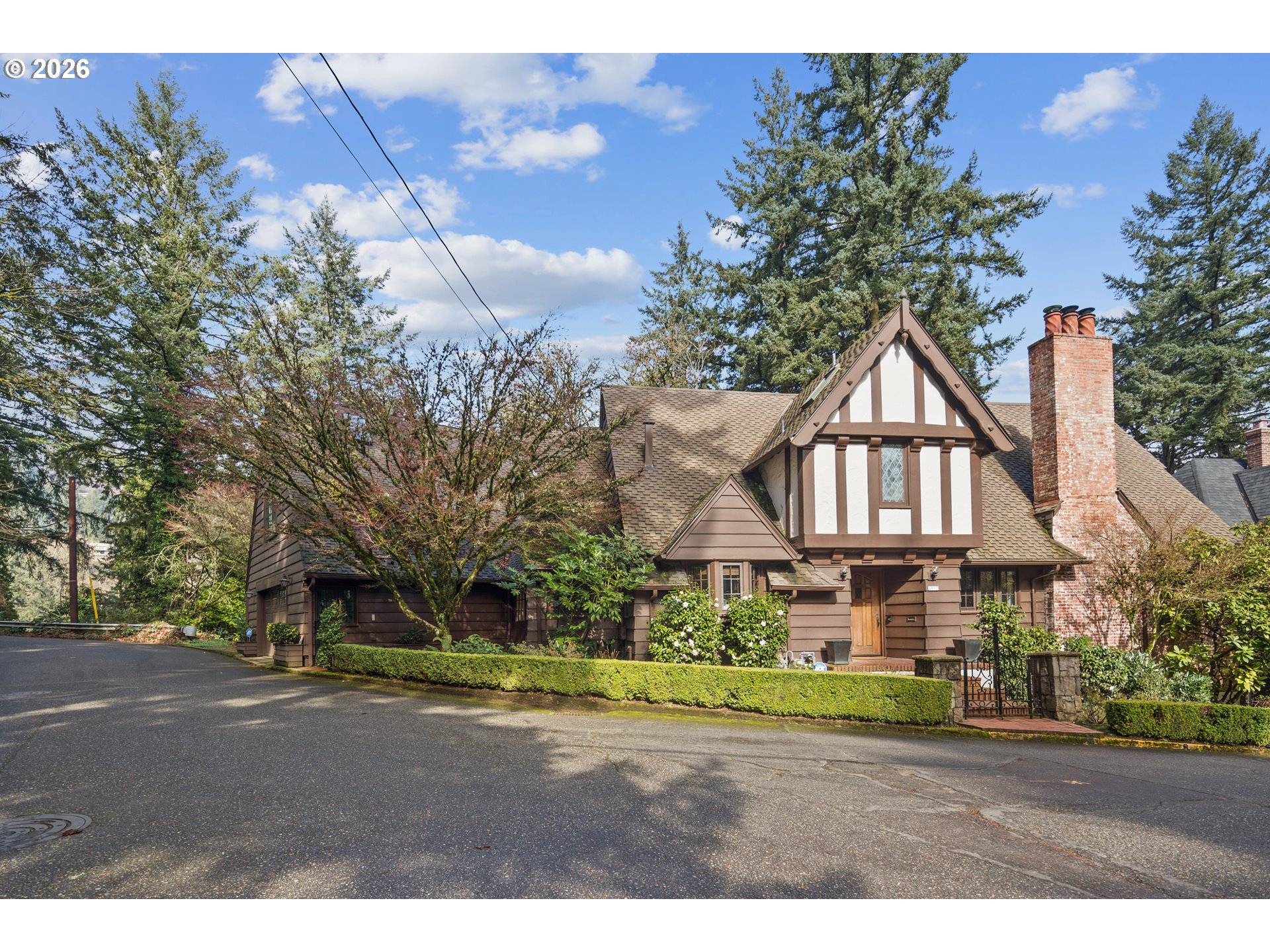 2897 Southwest Rutland Terrace Portland, OR 97205 - Photo 45 of 46 a front view of a house with a yard