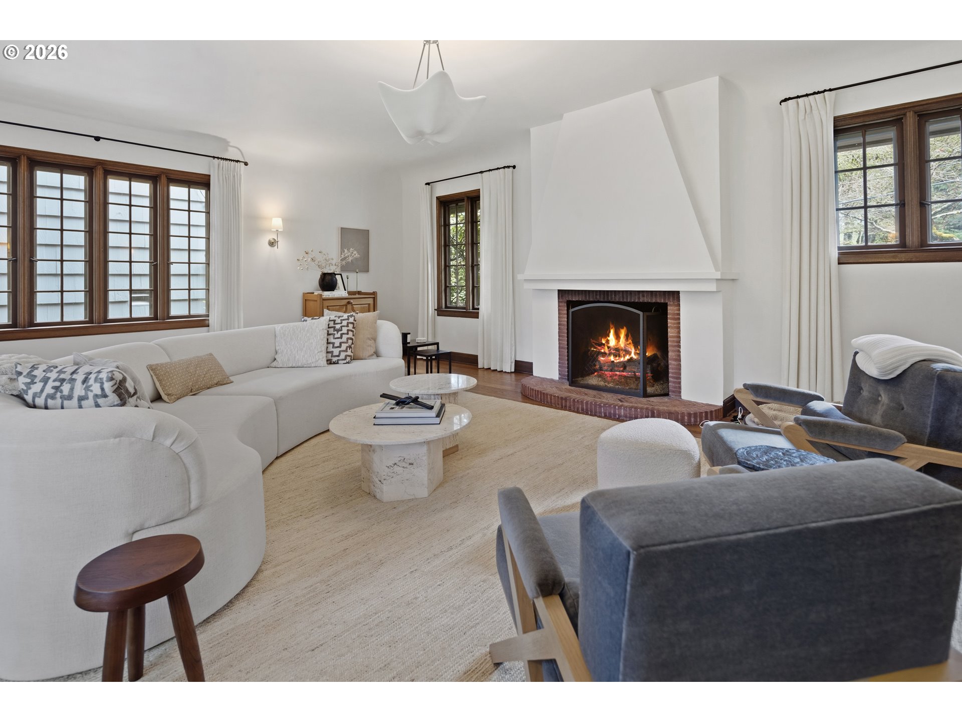 2897 Southwest Rutland Terrace Portland, OR 97205 - Photo 10 of 46 a living room with furniture and a fireplace