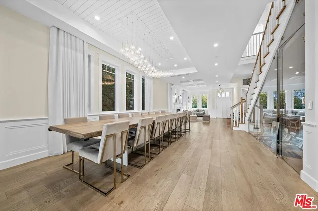 a view of a patio with table and chairs