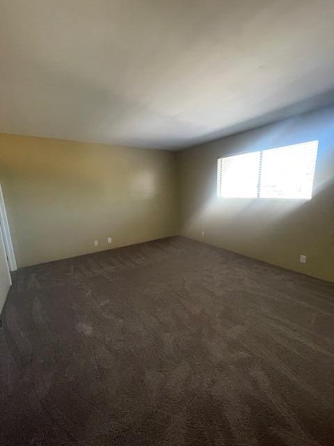 5301 East Waverly Drive, Unit 218 Palm Springs, CA 92264 - Photo 5 of 7 an empty room with a window