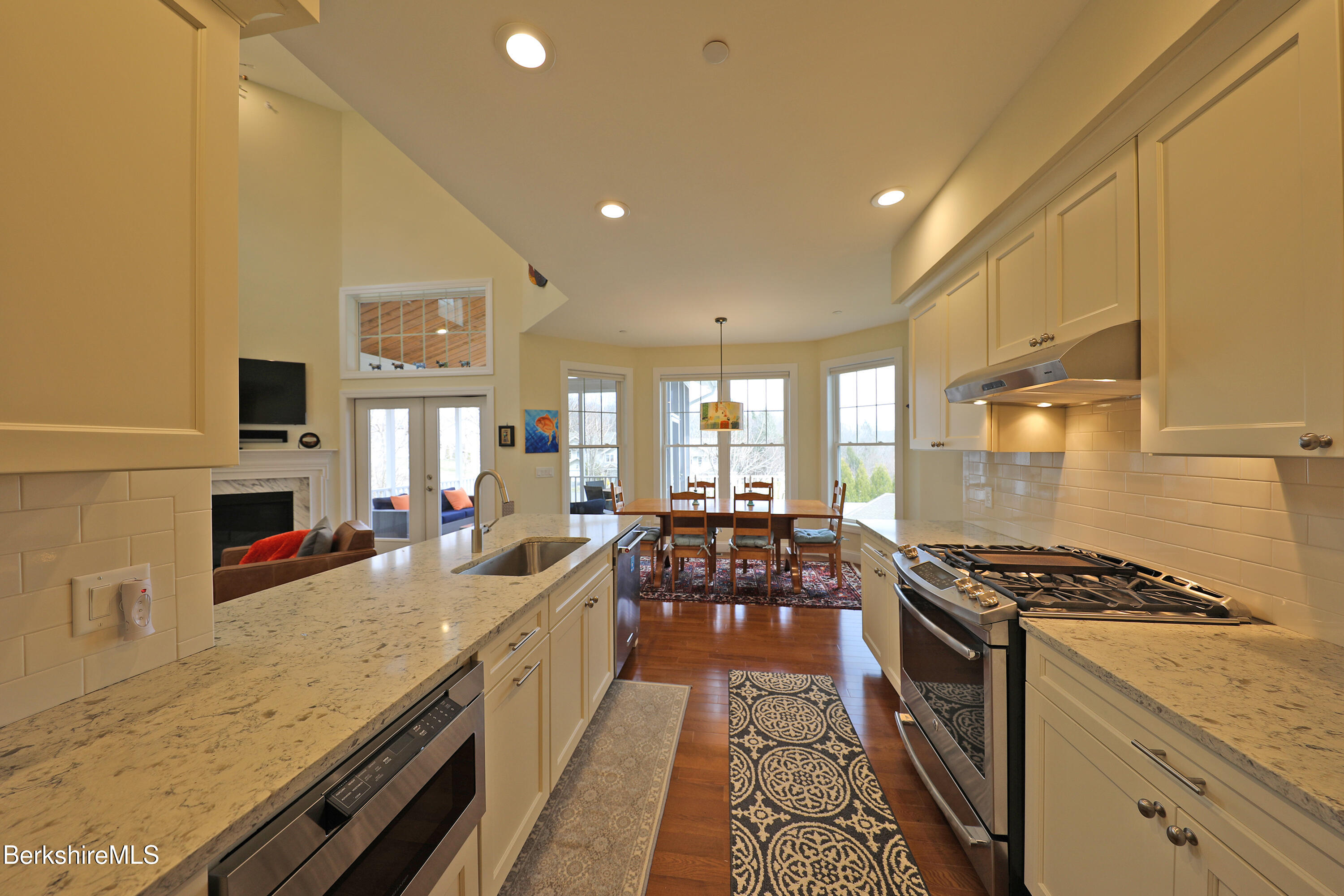 127 Alpine Trail Pittsfield, MA 01201 - Photo 13 of 54 a kitchen with stainless steel appliances granite countertop a stove and a sink