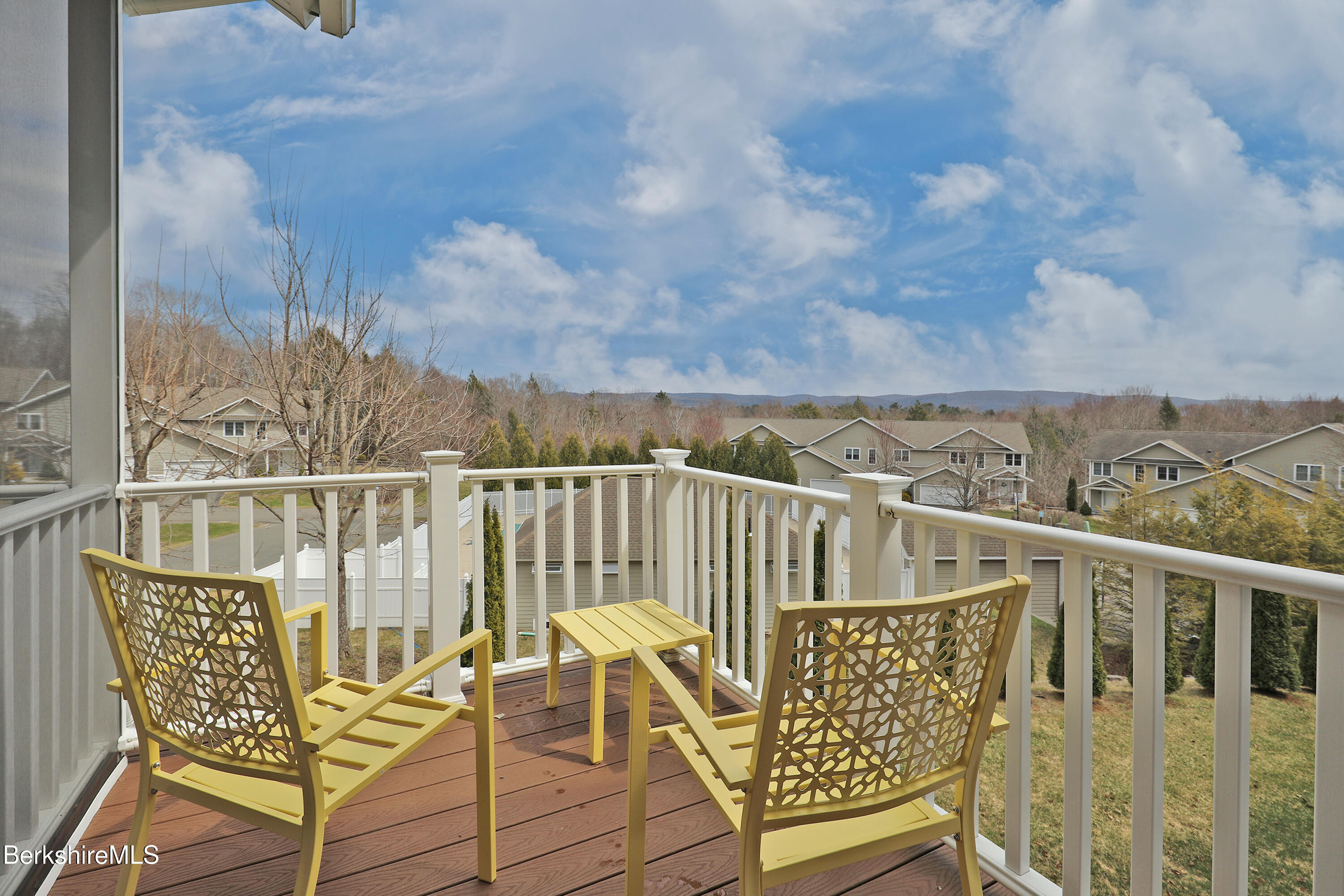 127 Alpine Trail Pittsfield, MA 01201 - Photo 18 of 54 a view of a chair and table on the terrace