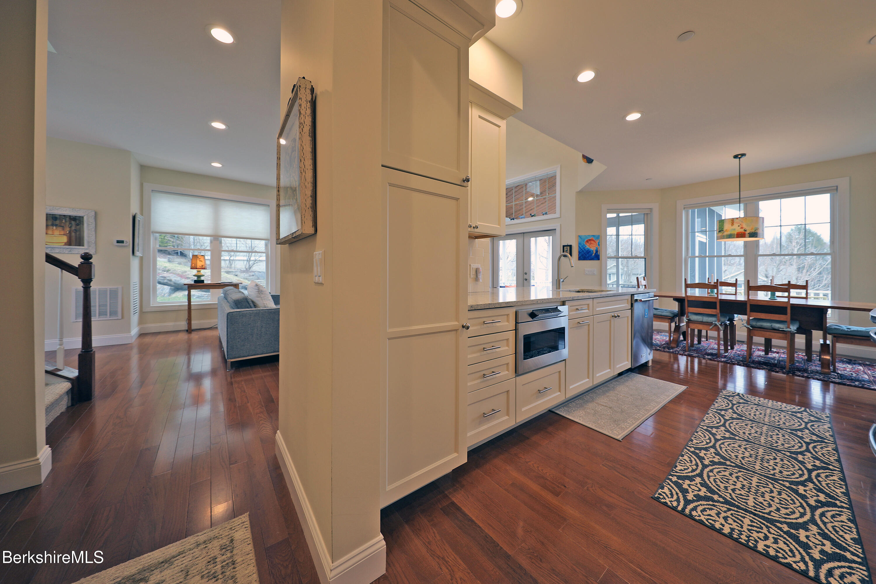 127 Alpine Trail Pittsfield, MA 01201 - Photo 19 of 54 a open kitchen with cabinets wooden floor and stainless steel appliances