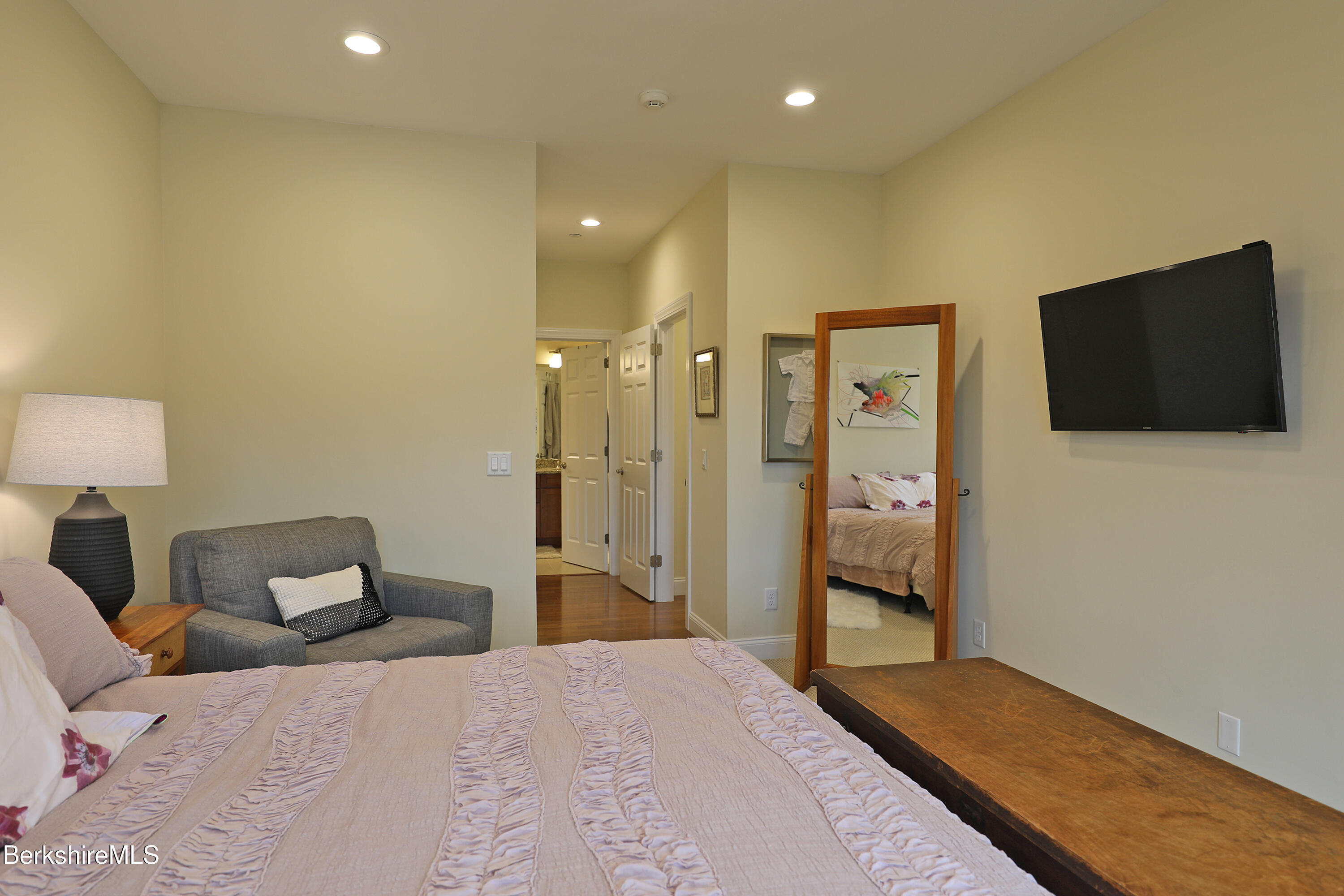 127 Alpine Trail Pittsfield, MA 01201 - Photo 23 of 54 a bedroom with a bed and a flat screen tv