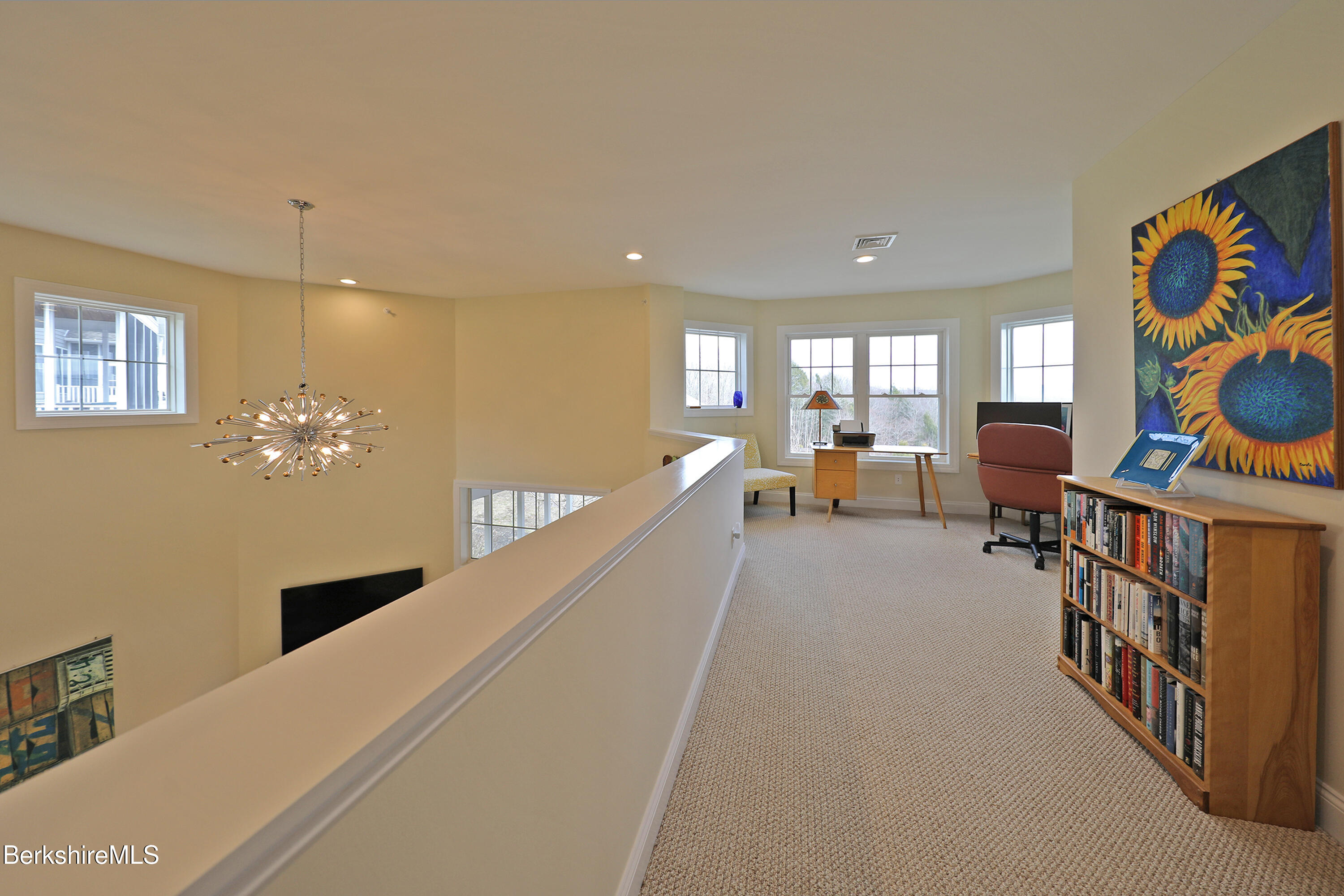 127 Alpine Trail Pittsfield, MA 01201 - Photo 28 of 54 a living room with furniture piano and a chandelier