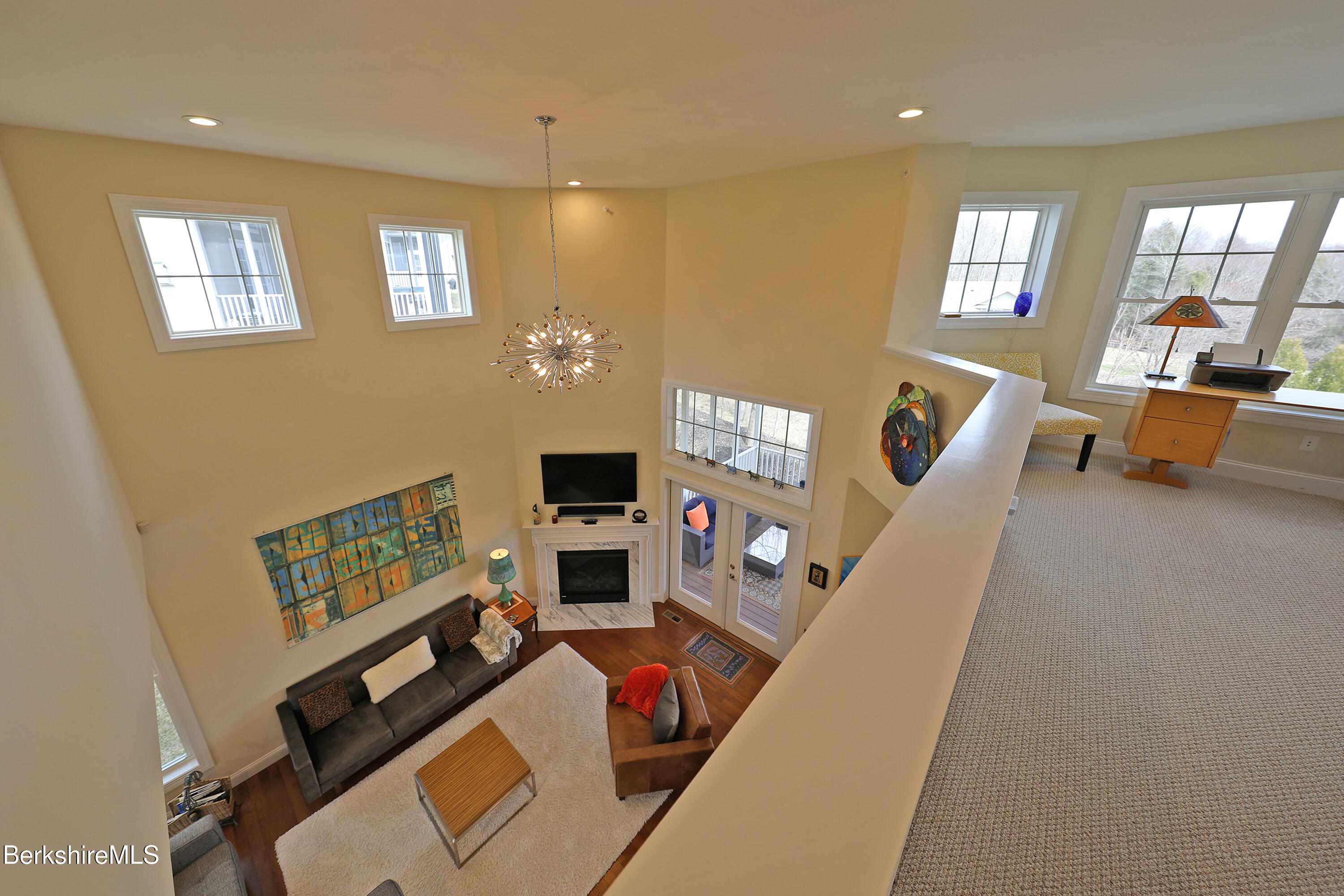 127 Alpine Trail Pittsfield, MA 01201 - Photo 29 of 54 a living room with furniture and a flat screen tv