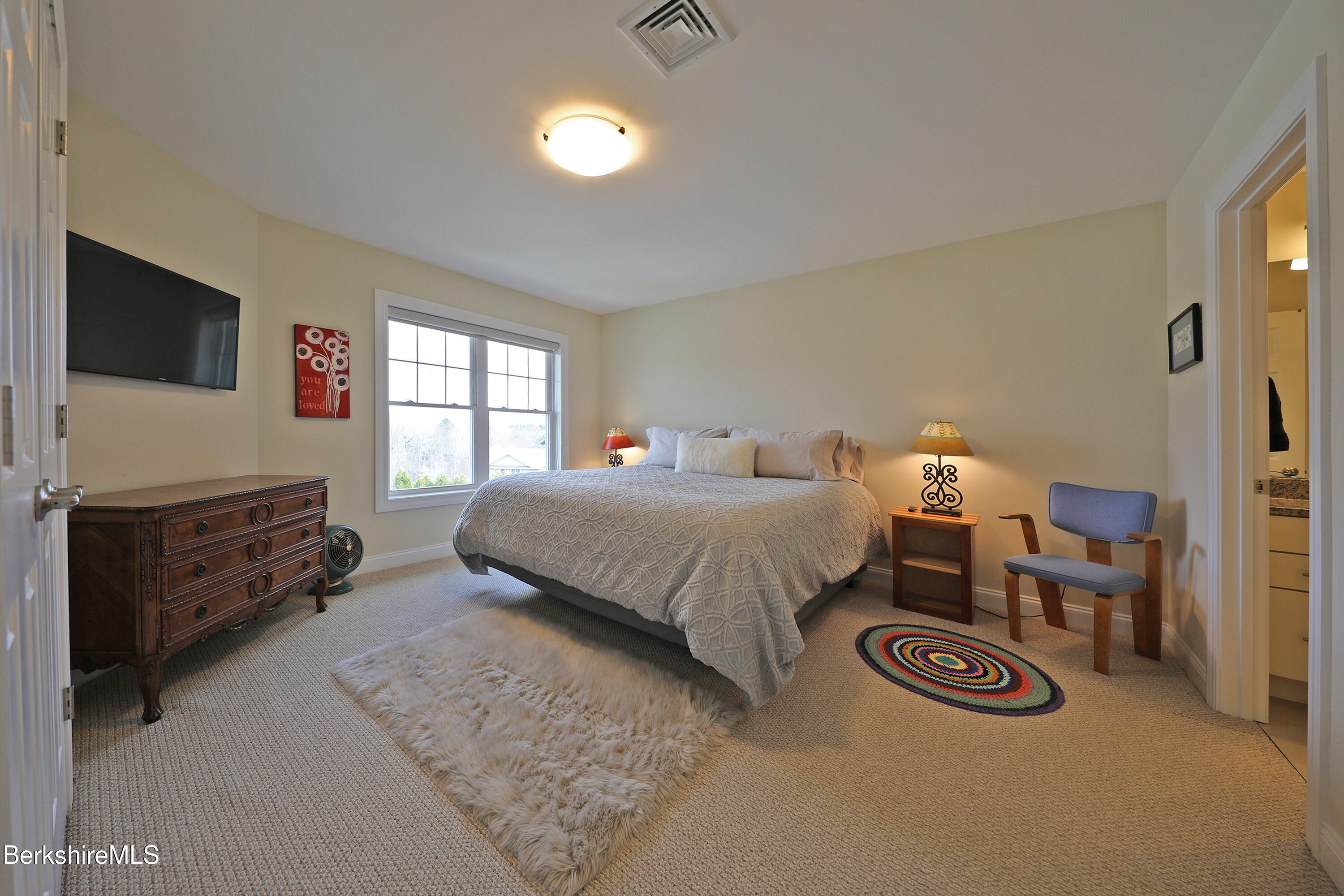 127 Alpine Trail Pittsfield, MA 01201 - Photo 35 of 54 a bedroom with a bed and a television