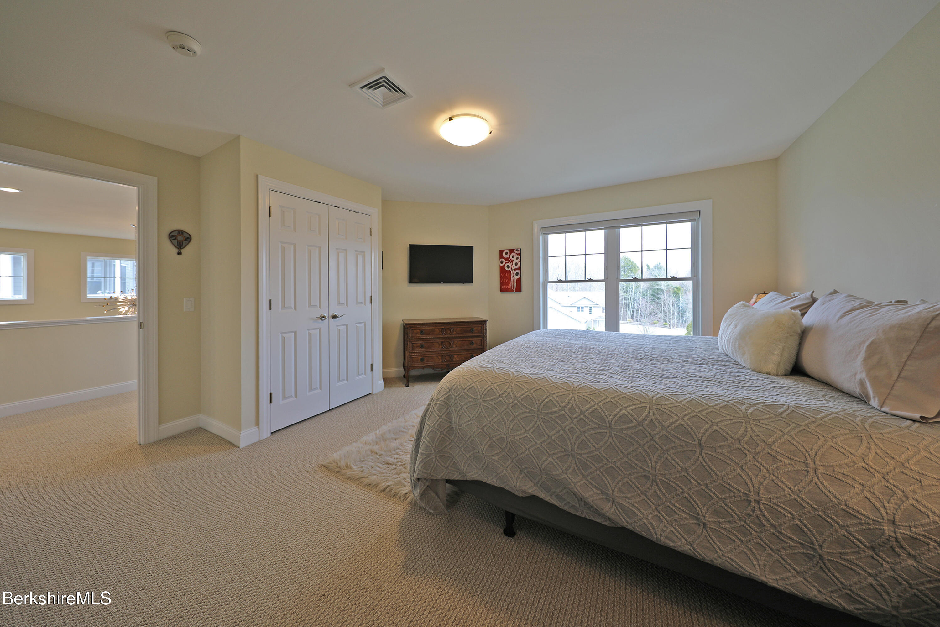 127 Alpine Trail Pittsfield, MA 01201 - Photo 37 of 54 a bedroom with a bed and a window