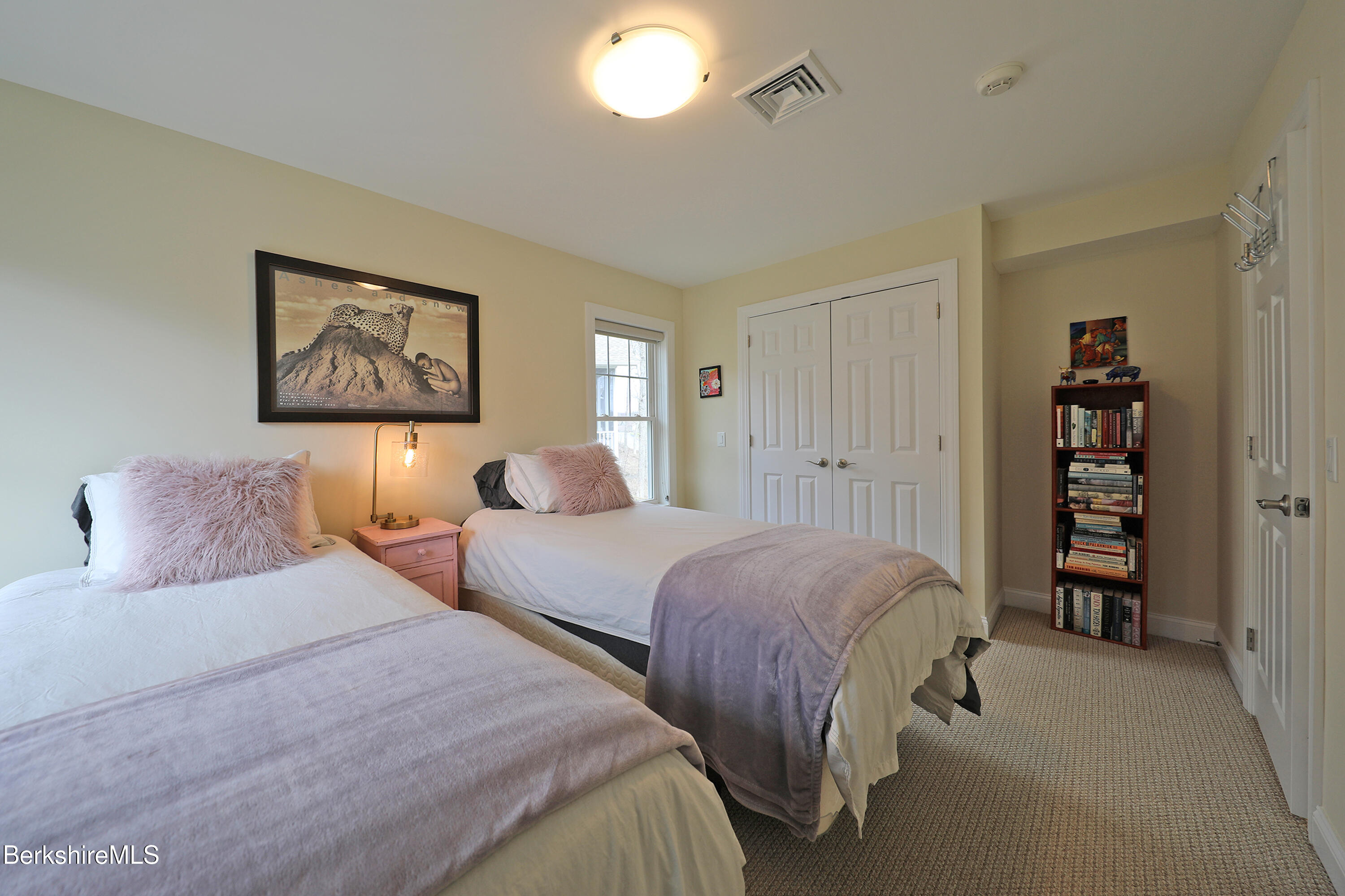 127 Alpine Trail Pittsfield, MA 01201 - Photo 41 of 54 a bedroom with two beds and a chandelier
