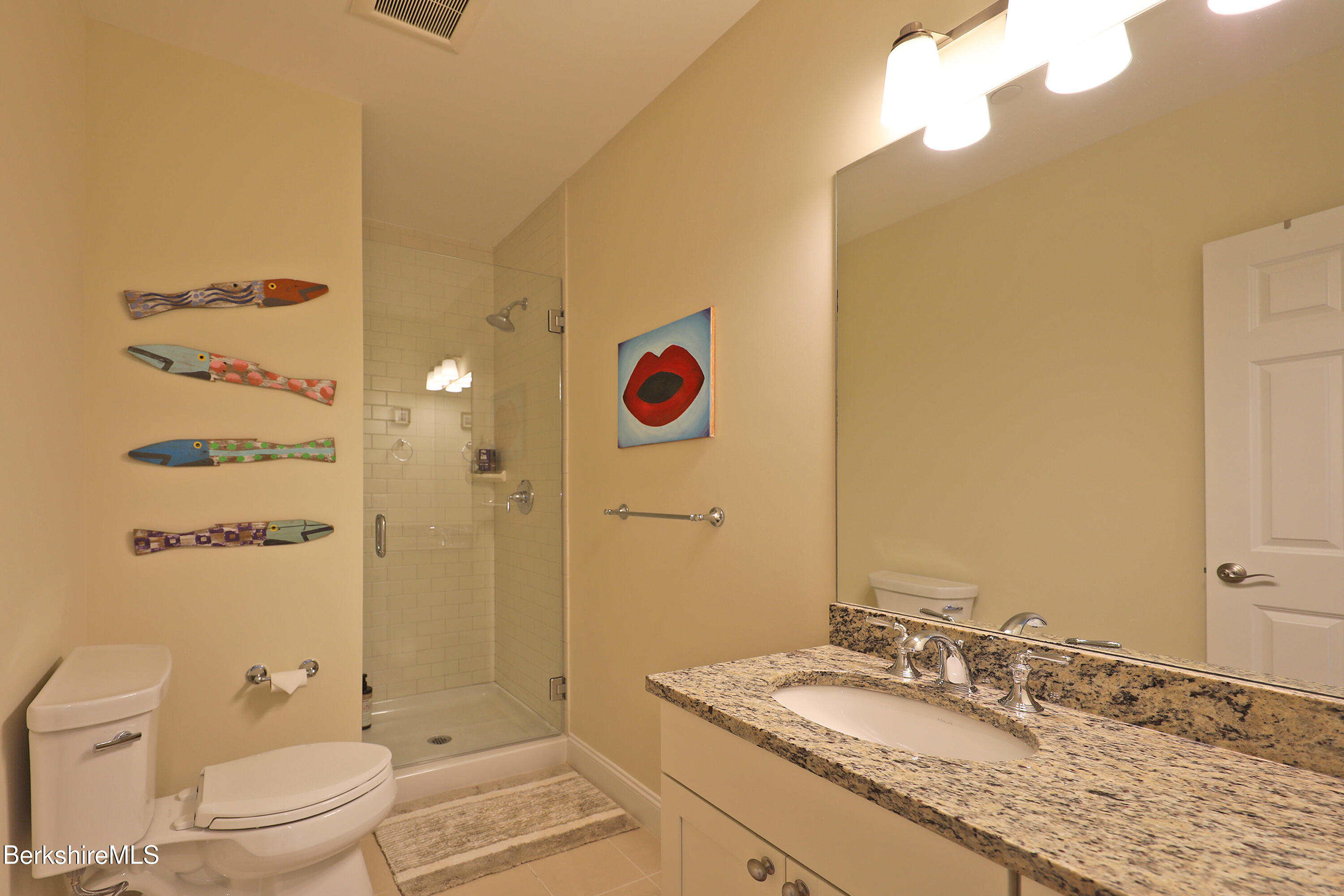 127 Alpine Trail Pittsfield, MA 01201 - Photo 52 of 54 a bathroom with a granite countertop sink mirror vanity and toilet