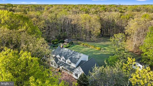a front view of a building with a garden