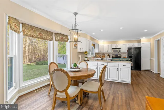 a view of storage and utility room with washer and dryer