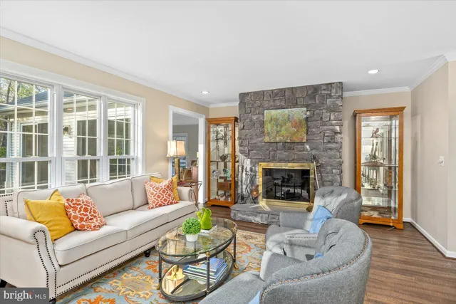 a bathroom with a double vanity sink mirror and toilet