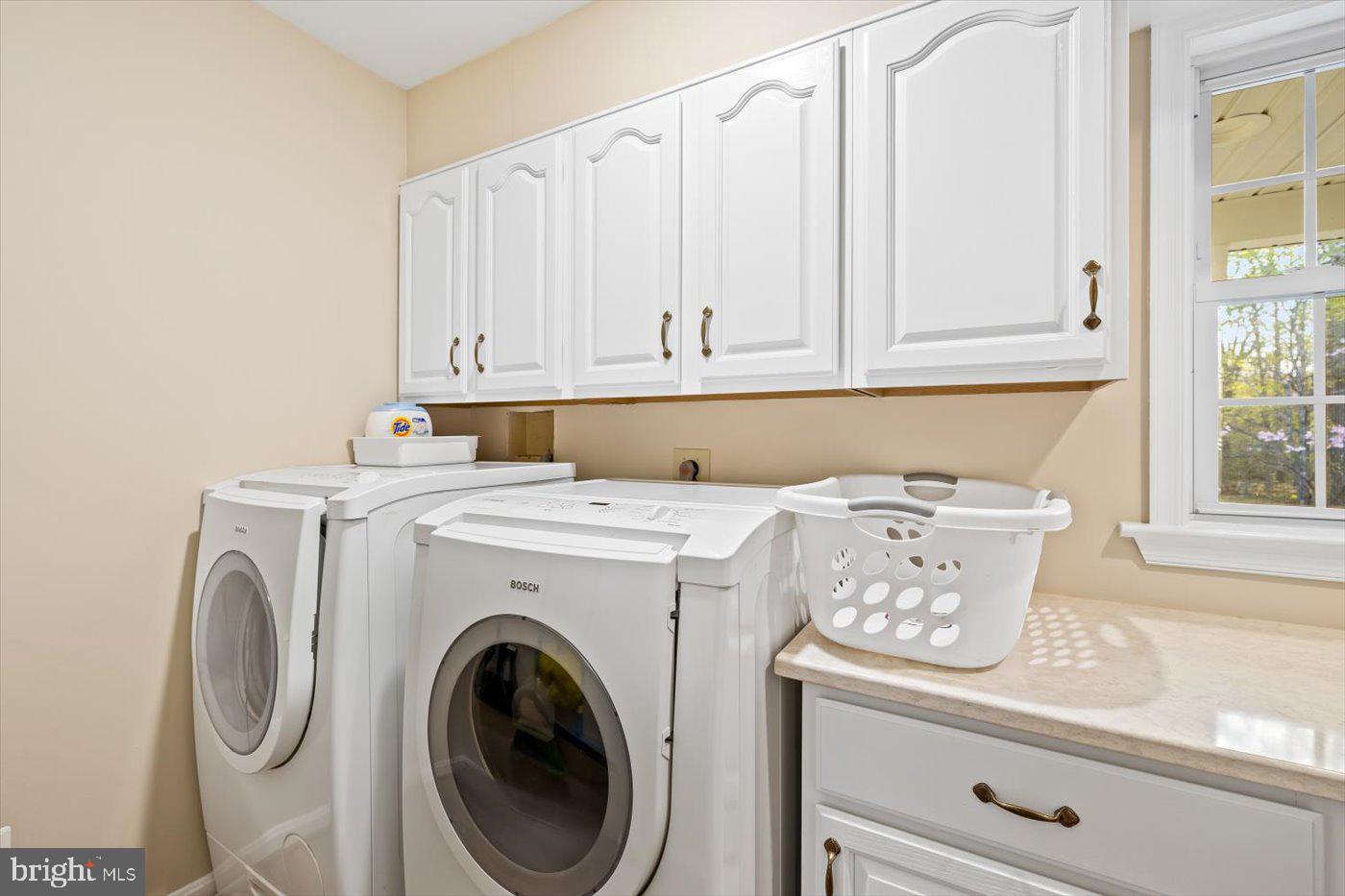 13037 Orange Plank Road Locust Grove, VA 22508 - Photo 34 of 71 a view of storage and utility room with washer and dryer