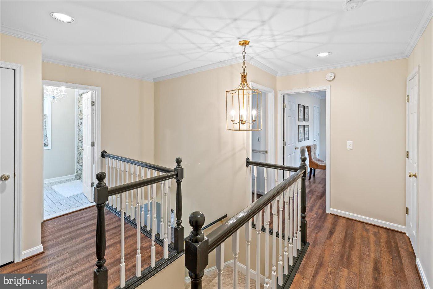 13037 Orange Plank Road Locust Grove, VA 22508 - Photo 35 of 71 a view of a hallway with wooden floor and staircase