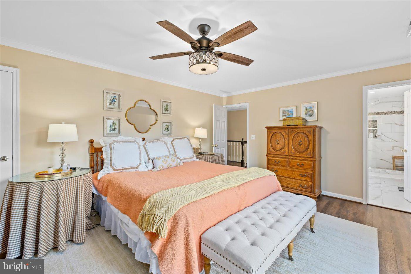 13037 Orange Plank Road Locust Grove, VA 22508 - Photo 36 of 71 a bedroom with a bed and ceiling fan