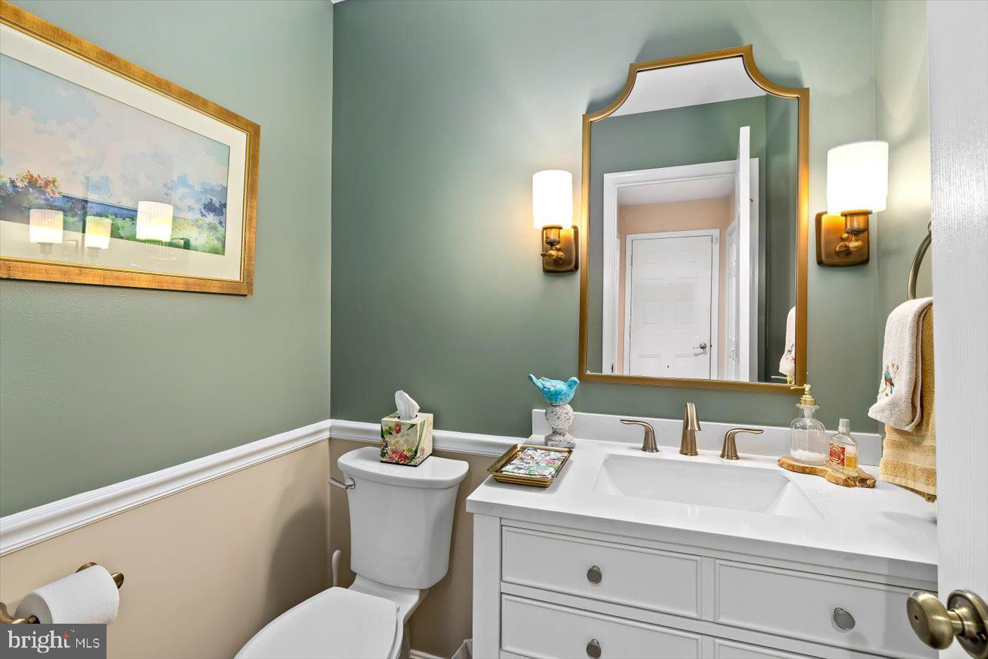 13037 Orange Plank Road Locust Grove, VA 22508 - Photo 47 of 71 a bathroom with a sink vanity mirror and toilet