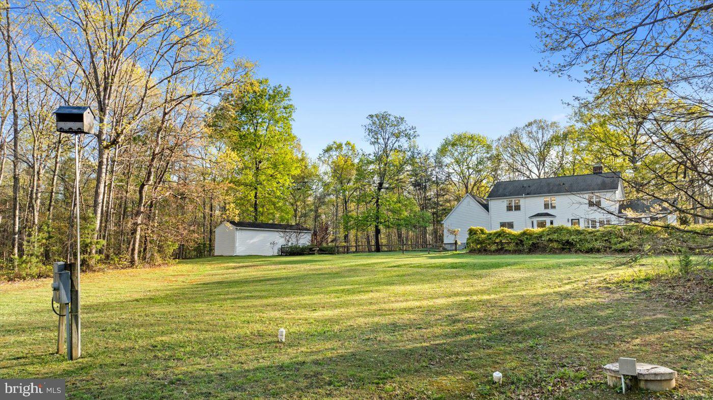 13037 Orange Plank Road Locust Grove, VA 22508 - Photo 59 of 71 a view of a house with a big yard