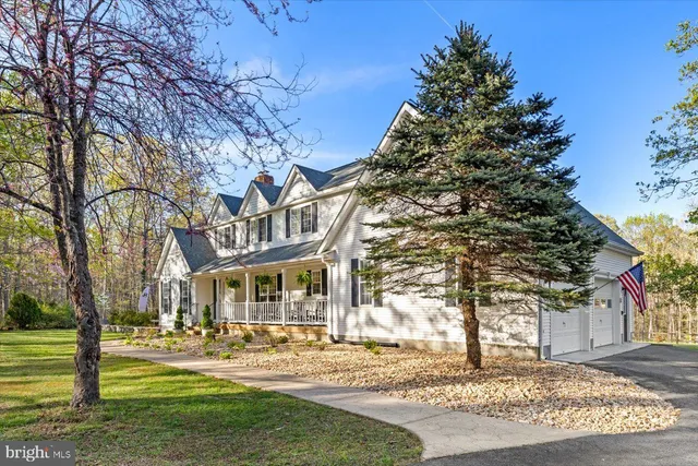 a view of a living room and wooden floor