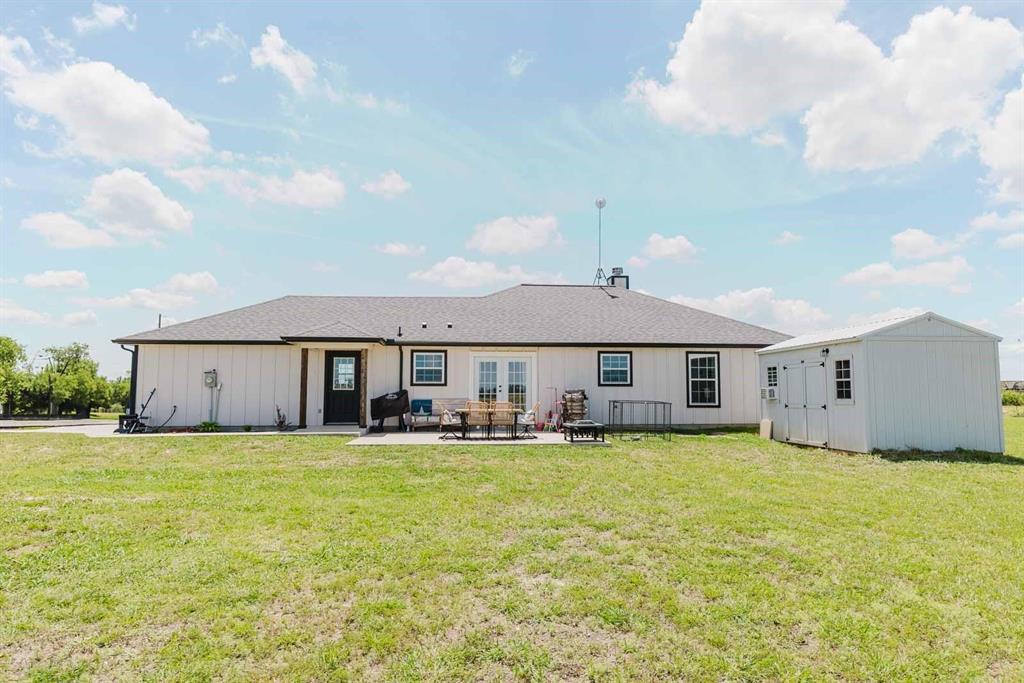8615 North Fm 51 Decatur, TX 76234 - Photo 3 of 26 a big house with a big yard and large trees