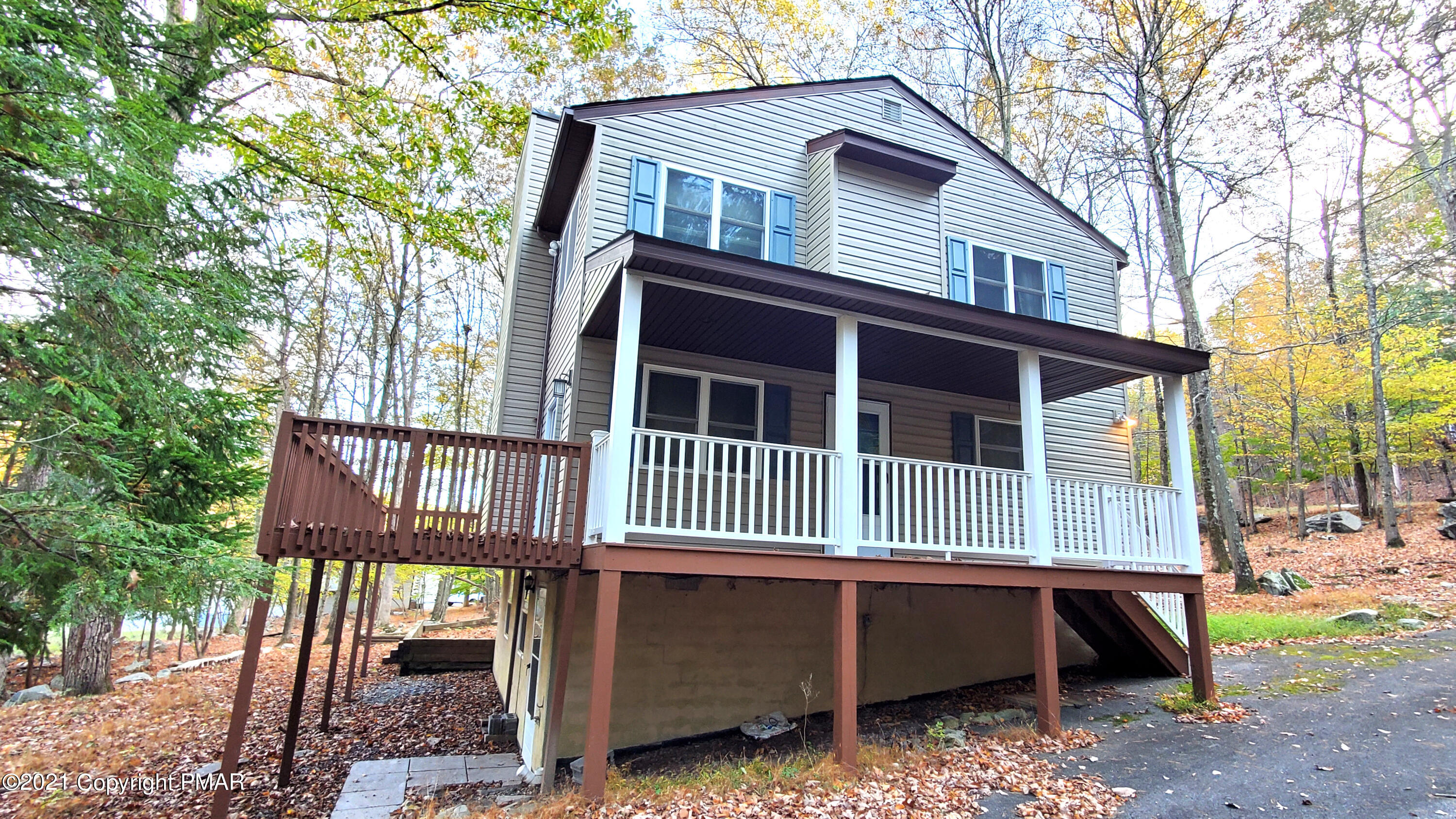 a front view of a house with a balcony