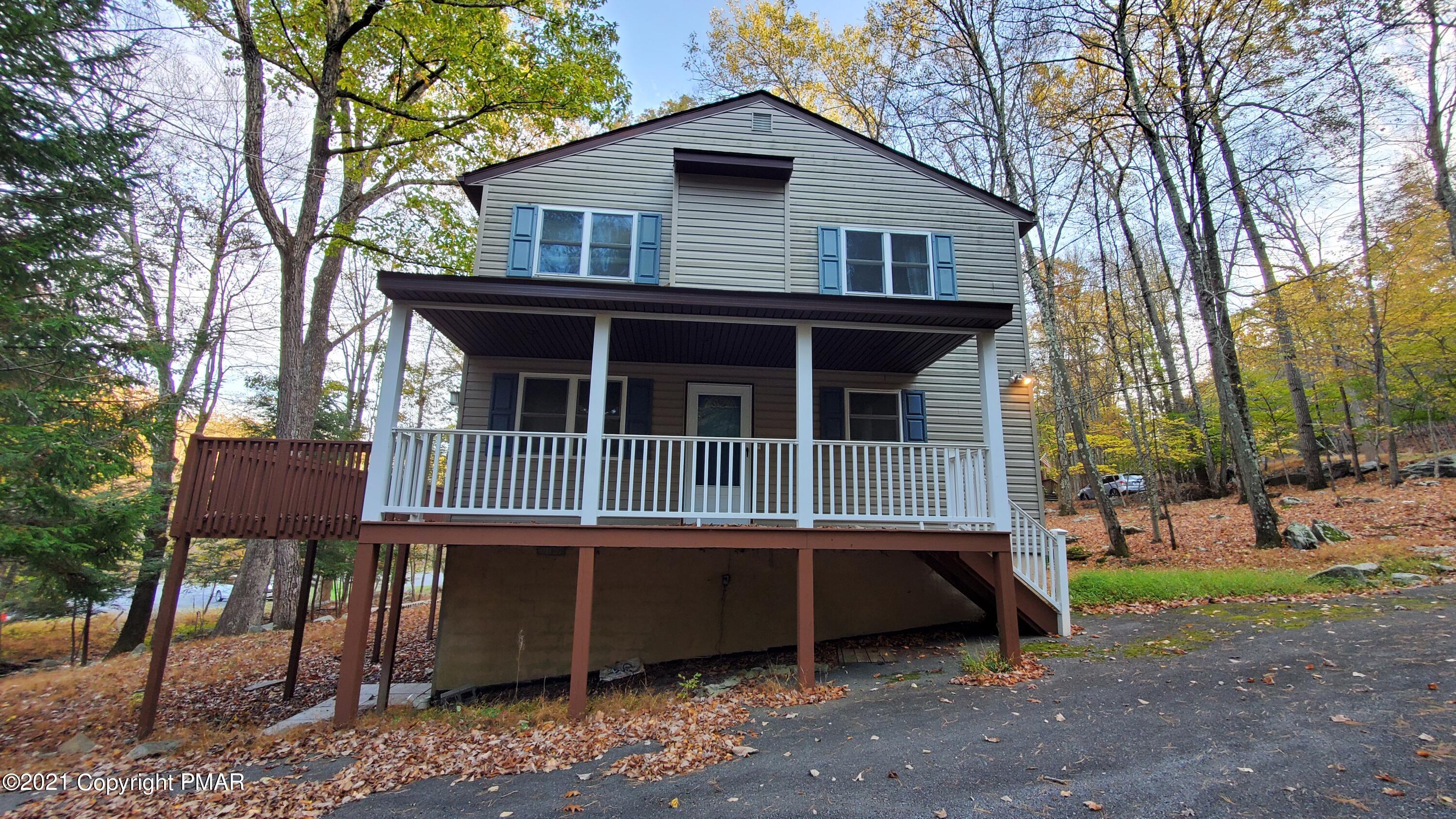 2111 Southport Drive Bushkill, PA 18324 - Photo 27 of 30 a house view with a garden space