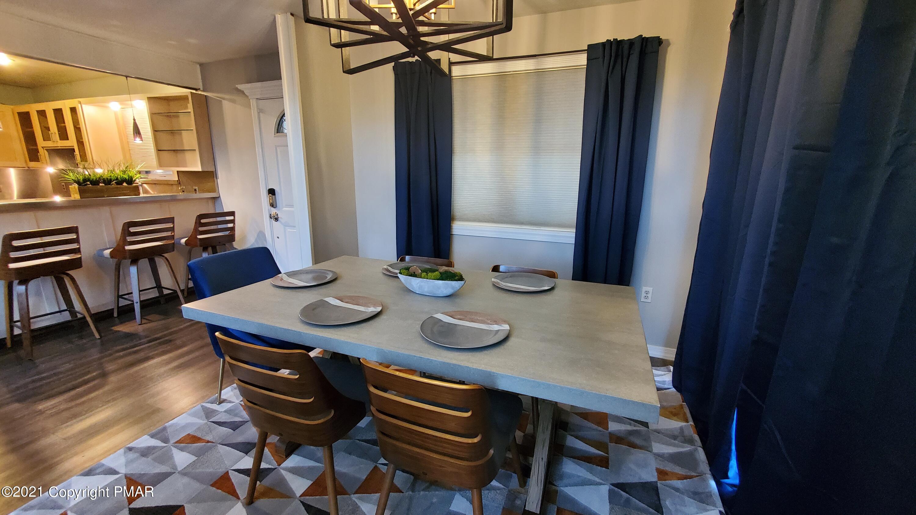 2111 Southport Drive Bushkill, PA 18324 - Photo 3 of 30 a view of a dining room with furniture and window