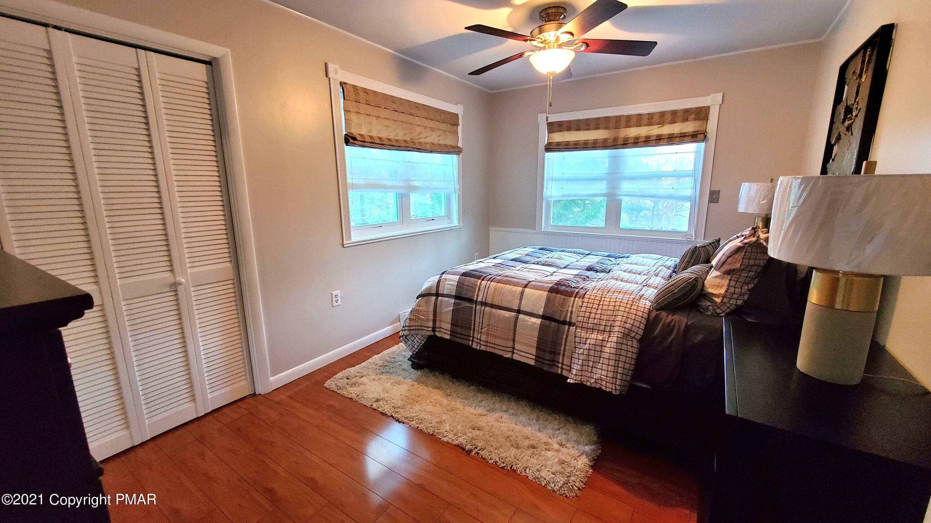 2111 Southport Drive Bushkill, PA 18324 - Photo 8 of 30 a bedroom with a bed and a window