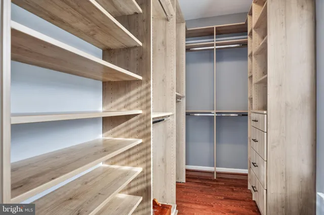 a view of a balcony with wooden floor