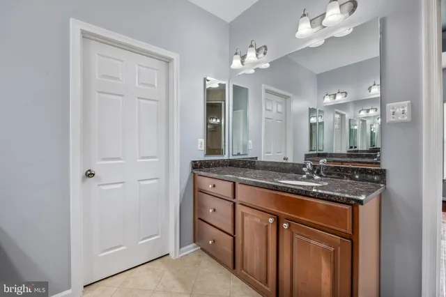 a view of a yard with large trees