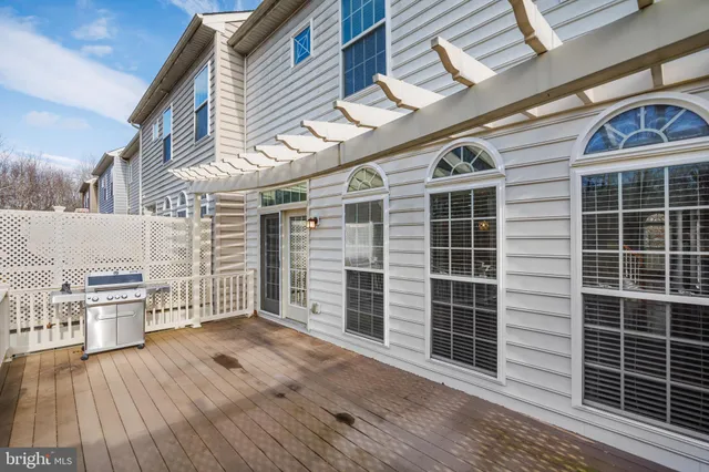 a view of a swimming pool with a yard
