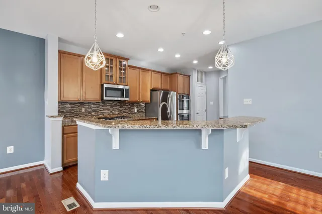 a view of an empty room with windows