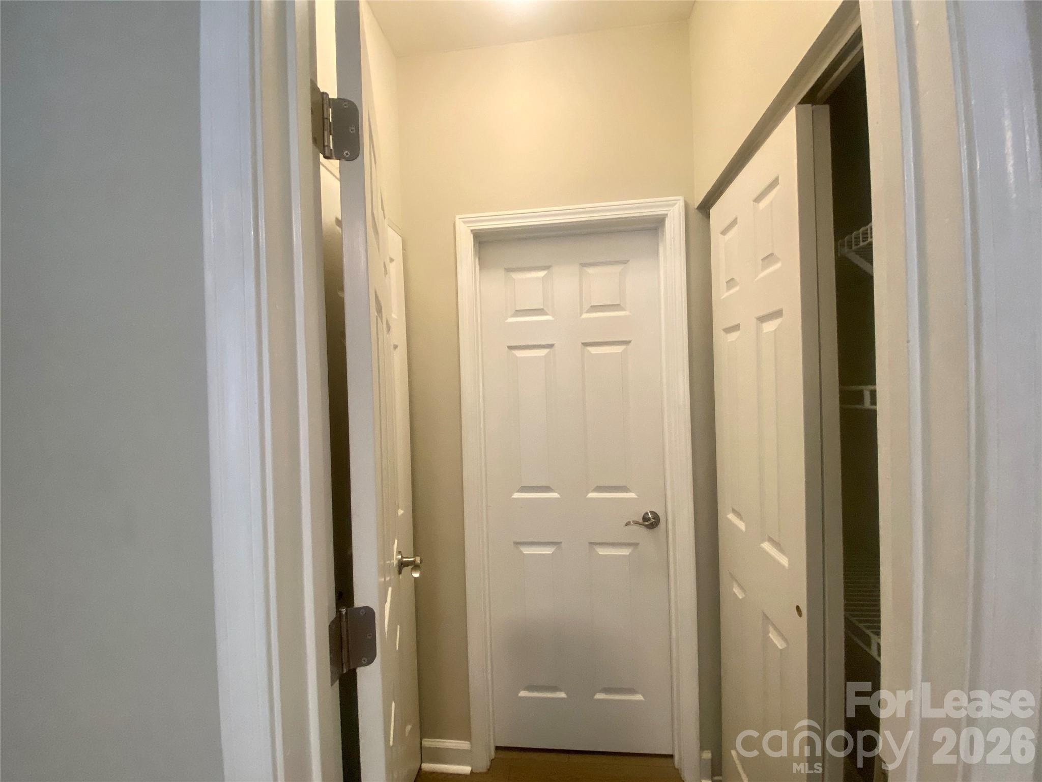 920 Jetton Street, Unit 49 Davidson, NC 28036 - Photo 25 of 33 a view of a bathroom from a hallway