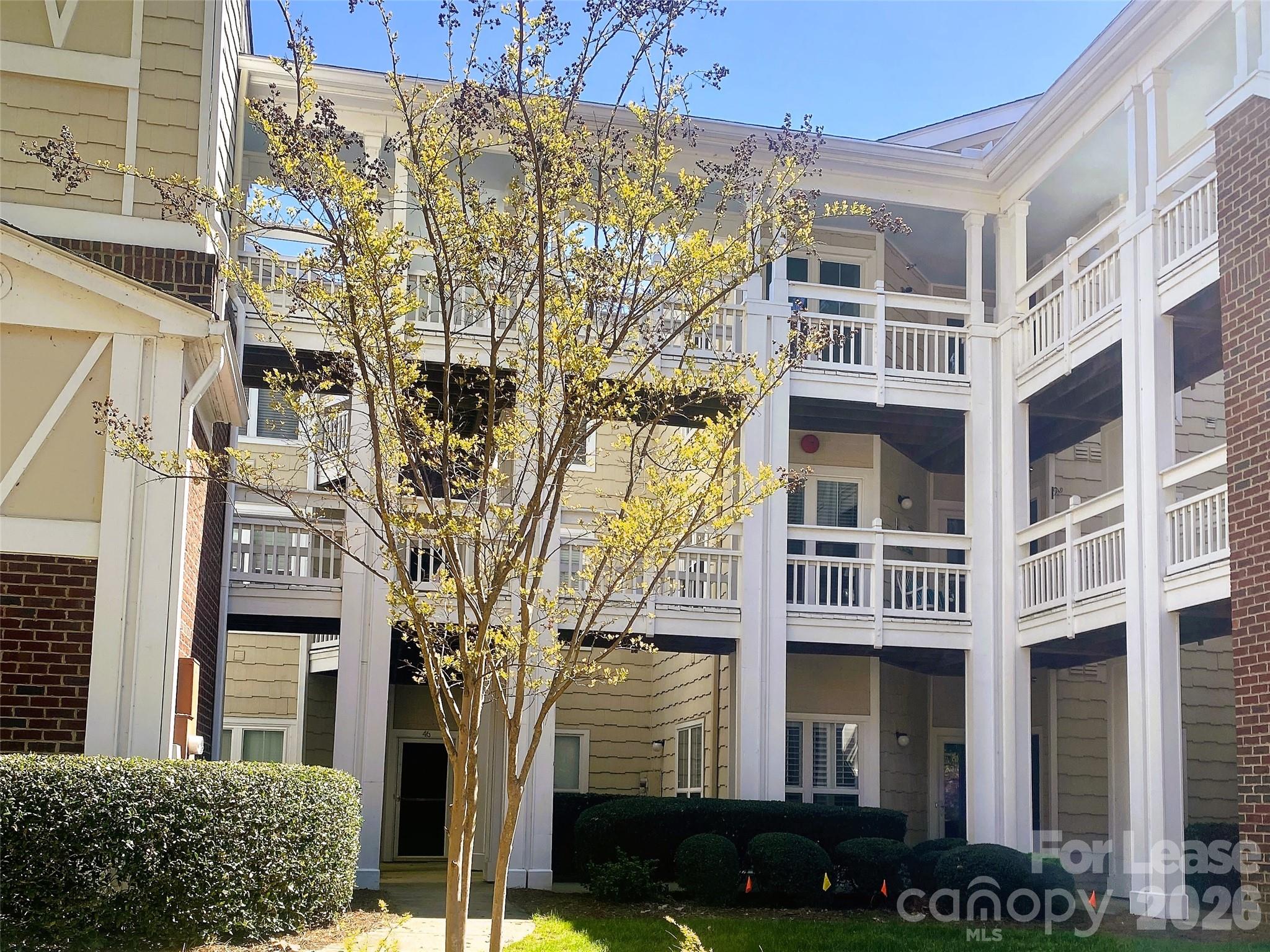 920 Jetton Street, Unit 49 Davidson, NC 28036 - Photo 28 of 33 a front view of a multi story building
