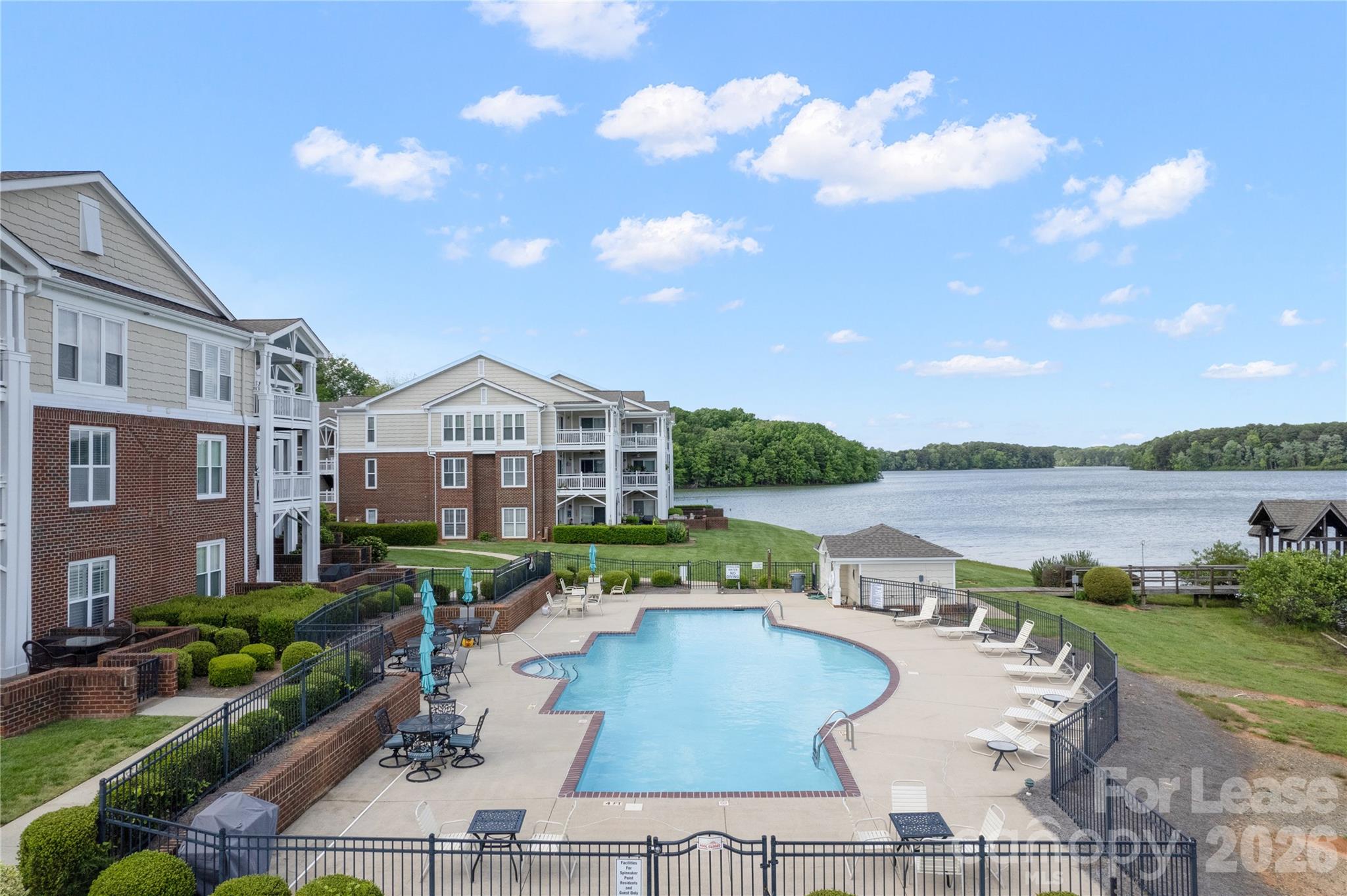 920 Jetton Street, Unit 49 Davidson, NC 28036 - Photo 5 of 33 a view of a house with yard and lake view