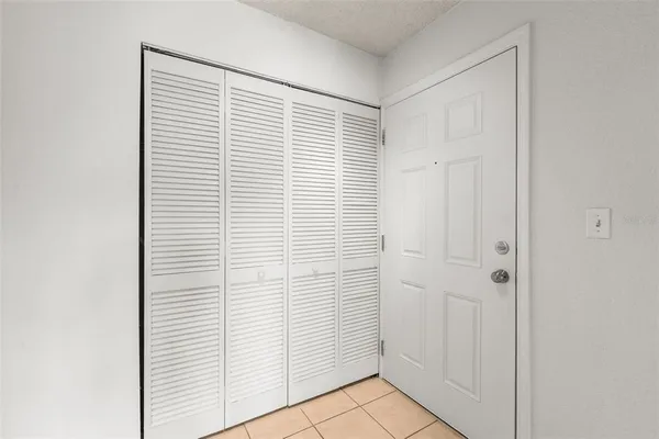 a view of a room that has a window in it