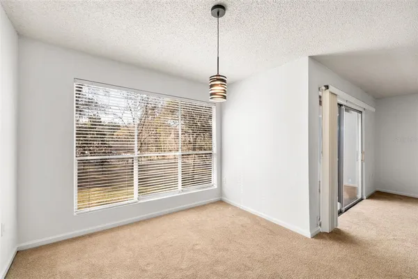 a view of a room with windows